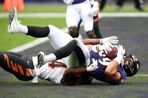 Ravens defense sacks Burrow 7 times in 27-3 rout of Bengals