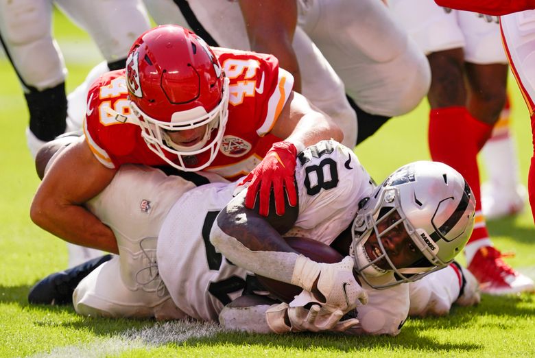 Las Vegas Raiders running back Josh Jacobs (28) gains yards on a