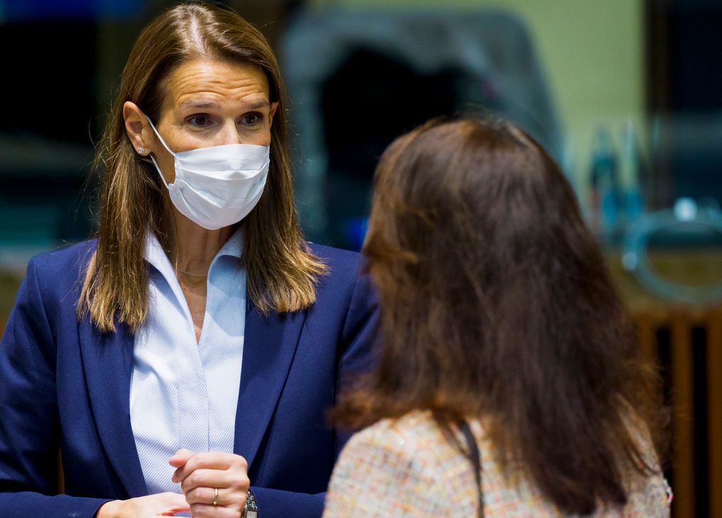 FILE – In this Monday, Oct. 12, 2020 file photo, Belgium’s Foreign Minister Sophie Wilmes, left, speaks with Sweden’s Foreign Minister Ann Linde during a meeting of European Union foreign ministers in Luxembourg. Former Belgian Prime minister Sophie Wilmes has been hospitalized in intensive care after getting infected with the coronavirus. The 45-year-old Wilmes, who was admitted to hospital on Wednesday evening Oct. 21, said last week she thought she got infected within her family circle. (Jean-Christophe Verhaegen, Pool via AP, File)