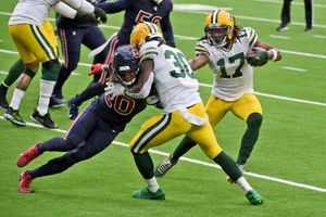 Rodgers throws 4 TDs as Packers beat Texans 35-20