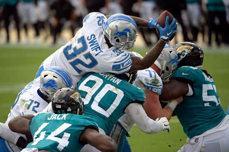 Stafford, Swift, Lions protect big lead, pound Jaguars 34-16