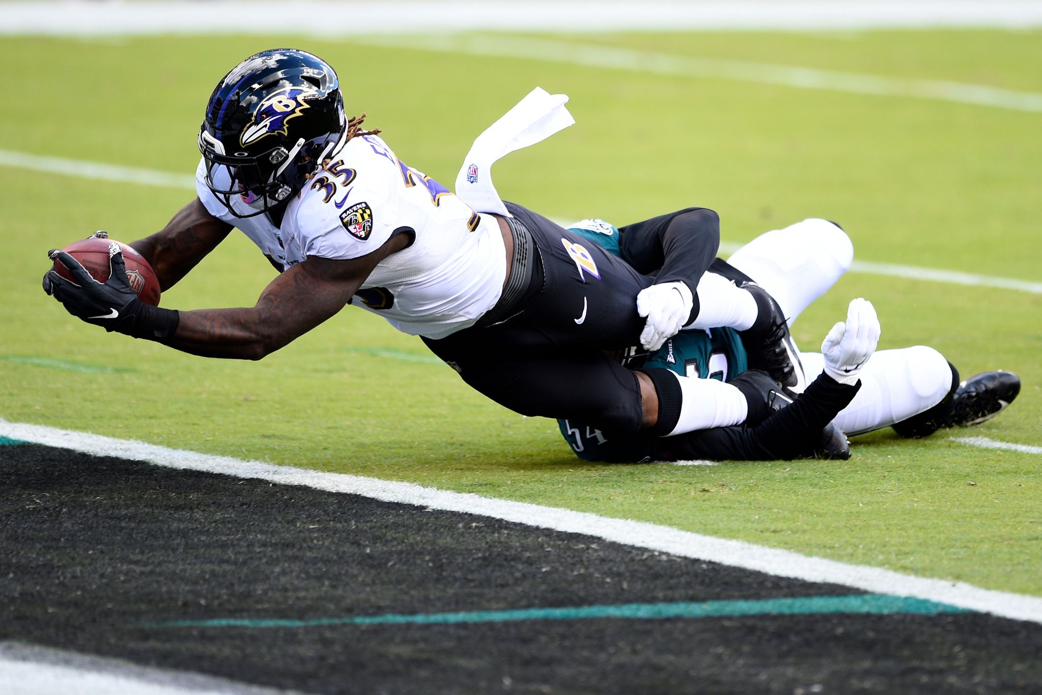 Ravens hold on for 30-28 win over depleted Eagles