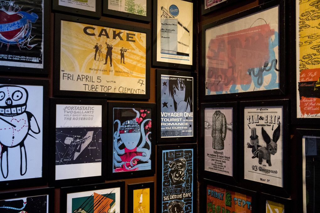 Posters from old shows line the walls of the Crocodile in Belltown. The Croc has been an important milestone club for Seattle greats from different genres and generations. (Amanda Snyder / The Seattle Times)