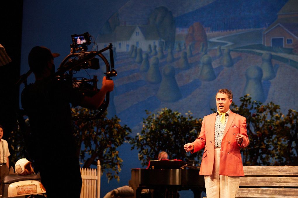 Camera operator Justin Brown captures video of Patrick Cafizzi, who plays Dulcamara. (Philip Newton)