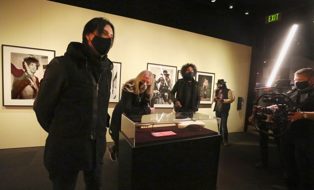Alice In Chains’ Sean Kinney, left, Jerry Cantrell, William DuVall and Mike Inez visit the Jimi Hendrix gallery at MoPOP as they record a video. The band is receiving MoPOP’s Founders Award this year, the 30th anniversary of its debut album “Facelift.” (Alan Berner / The Seattle Times)