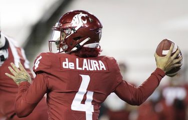 Washington State quarterback Jayden de Laura (4) throws a pass during the first half of the team’s NCAA college football game against Oregon in Pullman, Wash., Saturday, Nov. 14, 2020. (AP Photo/Young Kwak) WAYK104 WAYK104