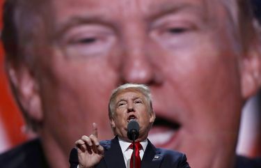 FILE – In this July 21, 2016, file photo, Republican Presidential Candidate Donald Trump, speaks during the final day of the Republican National Convention in Cleveland. (AP Photo/Carolyn Kaster, File) NYAG704 NYAG704