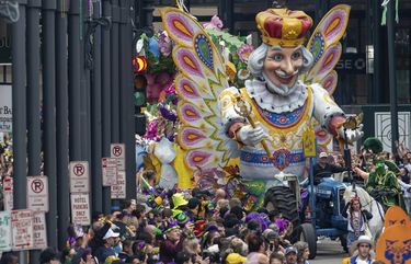 FILE – In this Feb. 25, 2020, file photo, the Butterfly King float makes it way down St. Charles Ave. near Canal Street as Rex rolls on Mardi Gras Day in New Orleans. There wonâ€™t be any parades on Mardi Gras or during the weeks leading up to it because they just can’t fit within restrictions to slow the spread of the coronavirus pandemic, a city spokesman said Tuesday, Nov. 17, 2020, The 250-person cap on outdoor crowds is â€œa hard number. You canâ€™t have traditional parades with that small a group,â€ city spokesman Beau Tidwell said. (David Grunfeld/The Advocate via AP, File) LABAT300 LABAT300