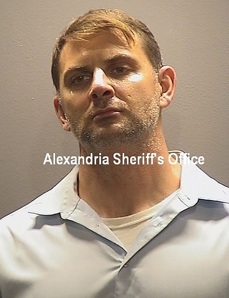 This file booking photo provided by the Alexandria, Va., Sheriff’s Office shows Peter Debbins, a former Army Green Beret who pleaded guilty Wednesday, Nov. 18, 2020, to divulging military secrets to Russia. He faces up to life in prison when he is sentenced in February. (Alexandria Sheriff’s Office via The Associated Press)