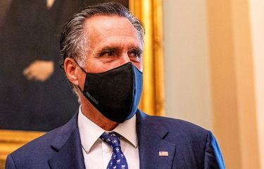 Sen. Mitt Romney speaks to reporters in the Capitol in September. MUST CREDIT: Washington Post photo by Demetrius Freeman