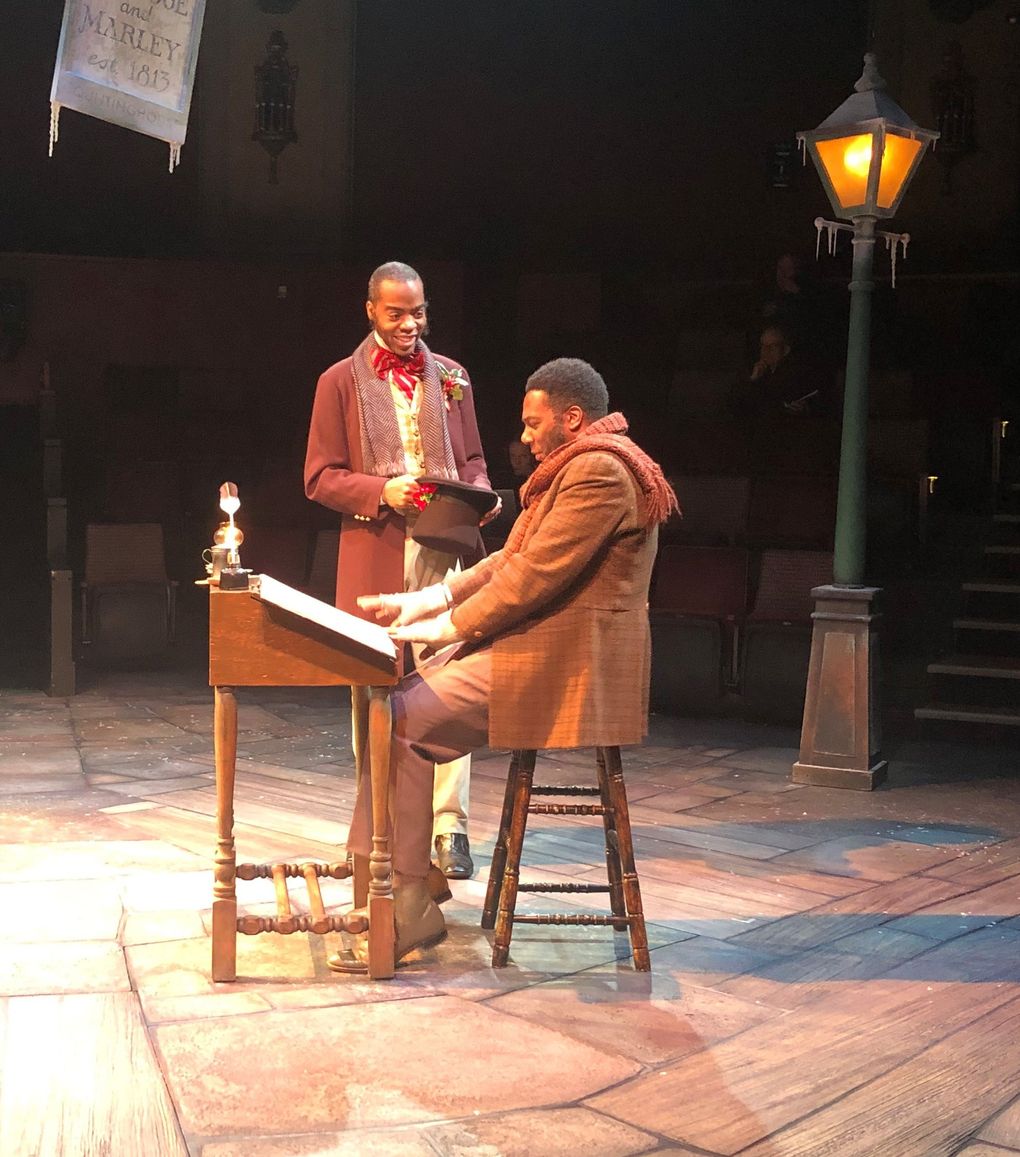 Arlando Smith as Fred and Reginald A. Jackson as Bob Cratchit in ACT’s 2018 production of “A Christmas Carol.” (Amy Gentry)