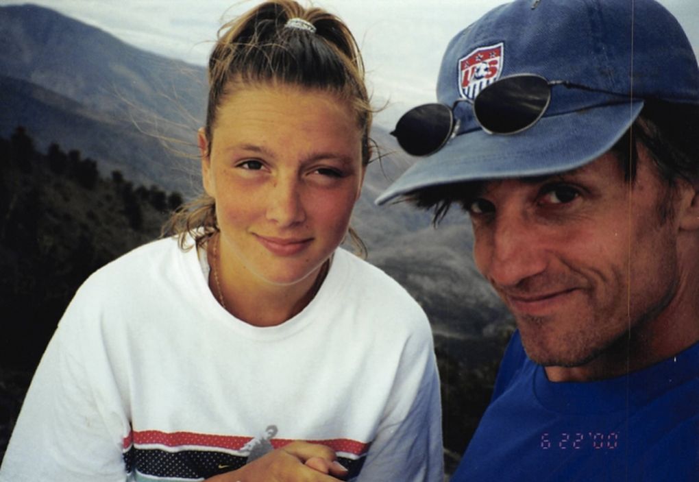 Amy Carnell is pictured here in 2000 with her Northwest Nationals Stellarz coach Michael Koslosky. Koslosky was driving Carnell to and from a California tournament alone. Parents on the trip questioned the driving arrangement and somebody claiming to be from the state’s governing youth soccer body later phoned Carnell’s mother saying someone had complained and suspected sexual abuse. (Courtesy of Amy Carnell)