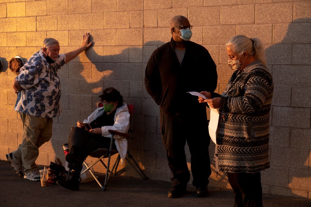 Voters line up outside a polling place in Las Vegas early Tuesday. Patience is a virtue that municipal leaders, meditation experts and anyone who has glanced in passing at various Election Day scenarios keep urging voters to embrace. Fine, but easier said than done. (Bridget Bennett / The New York Times)