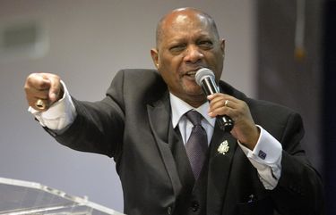 FILE – In this Jan. 1, 2018, file photo Bishop Reginald T. Jackson, the presiding prelate of the Sixth Episcopal District of the African Methodist Episcopal (A.M.E.) Church, speaks at the 155th Emancipation Proclamation Day Celebration held at the Greater Emmanuel Tabernacle in Savannah, Ga. (Steve Bisson/Savannah Morning News via AP, File) GASAV222 GASAV222