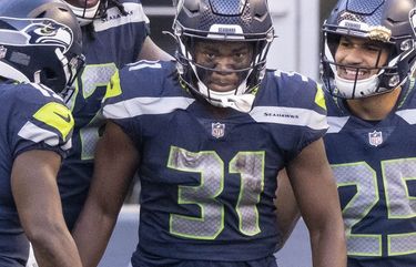 Seattle Seahawks running back DeeJay Dallas (31) during an NFL football game  against the Denver Broncos, Monday, Sept. 12, 2022, in Seattle, WA. The  Seahawks defeated the Bears 17-16. (AP Photo/Ben VanHouten