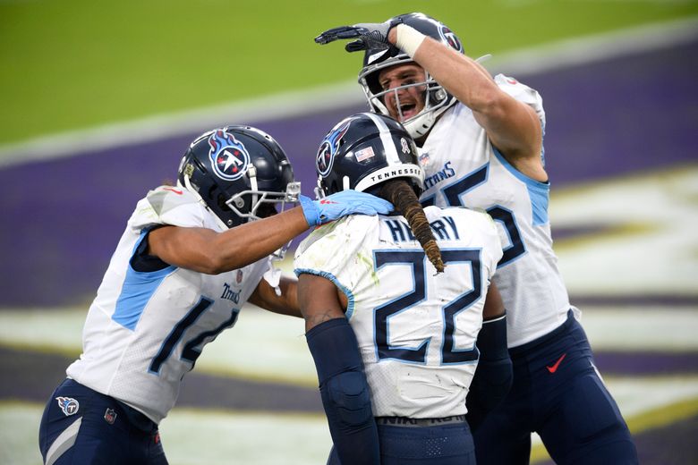 Henry's TD run in OT lifts Titans over skidding Ravens 30-24