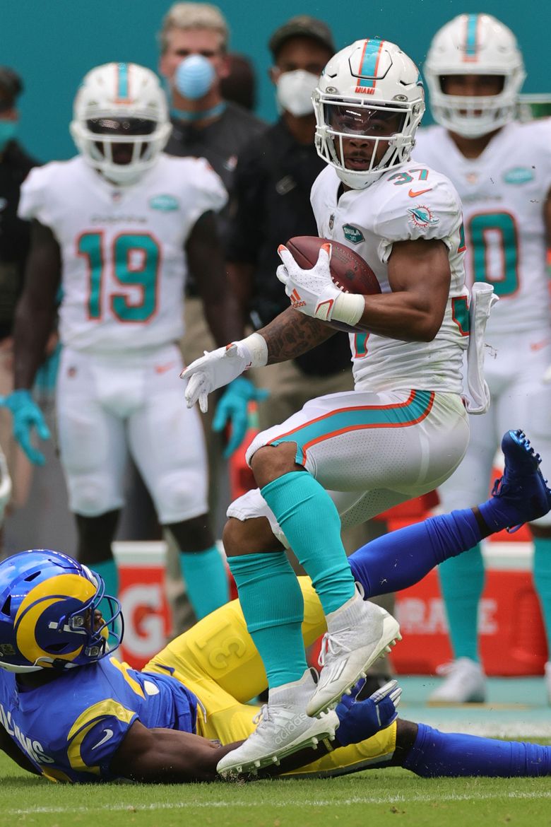 Dolphins RBs Gaskin and Breida miss practice with injuries | The Seattle  Times