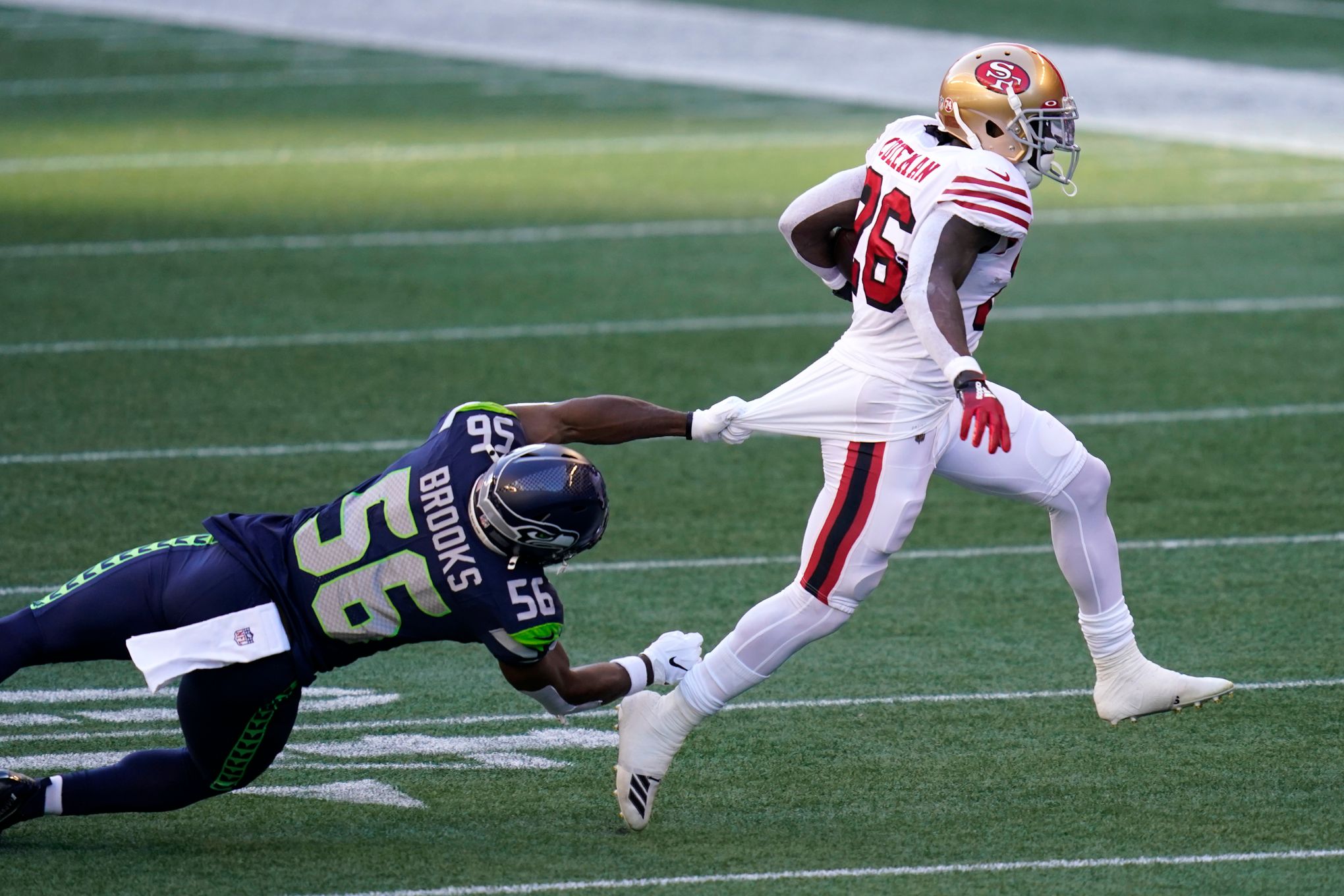 Seattle Seahawks linebacker Jordyn Brooks (56) in action during an