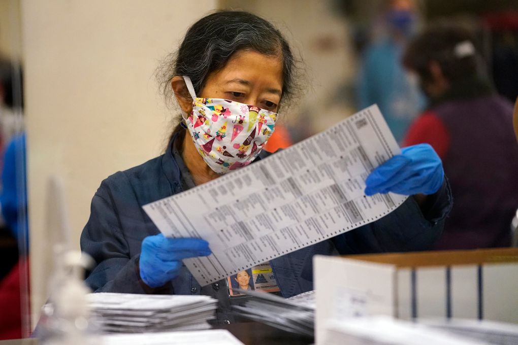 An election worker sorts mail-in ballots at the Multnomah County Duniway-Lovejoy Elections Building Monday, Nov. 2, 2020, in Portland, Ore. (AP Photo/Marcio Jose Sanchez)