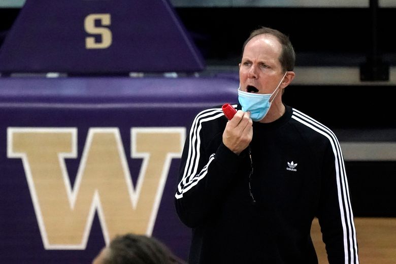 Washington head coach Mike Hopkins directs his team during an NCAA college basketball practice Tuesday, Oct. 27, 2020, in Seattle. The first two seasons went nearly perfect for Hopkins. A season of taking over and building a foundation and trust was followed by a season where it all meshed into a Pac-12 regular season title and a return to the NCAA tournament. But in year three, the Huskies finished last in the conference and with a below .500 record. (AP Photo/Elaine Thompson)