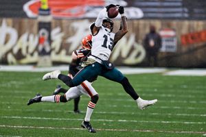 Browns survive without Garrett, down Eagles in steady rain