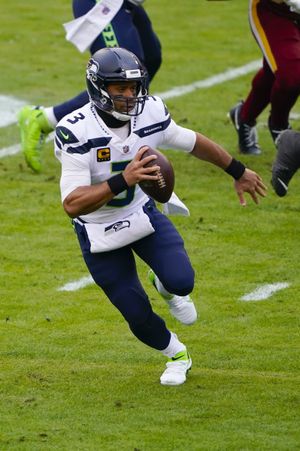 Seattle Seahawks' running back Leon Washington celebrates (33) their 41-36  win over the Super Bowl Defending Champions in the NFC's wild-card playoff  game on Saturday January 8, 2011 at Qwest Field in