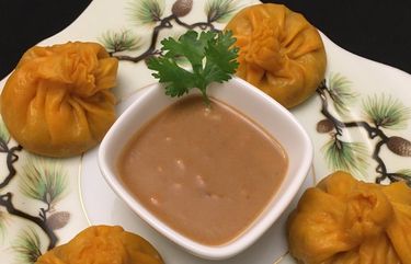 To try and mask the taste of cooked carrots – carrots were one of the requisite ingredients, Steve Venard and Cathy Martin decided to mix in some ginger, which led them toward Asian flavors, which apparently led them to turn Thanksgiving leftovers into Chinese soup dumplings.