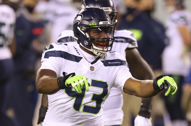 Seahawks notebook: Carlos Dunlap's foot injury 'nothing serious