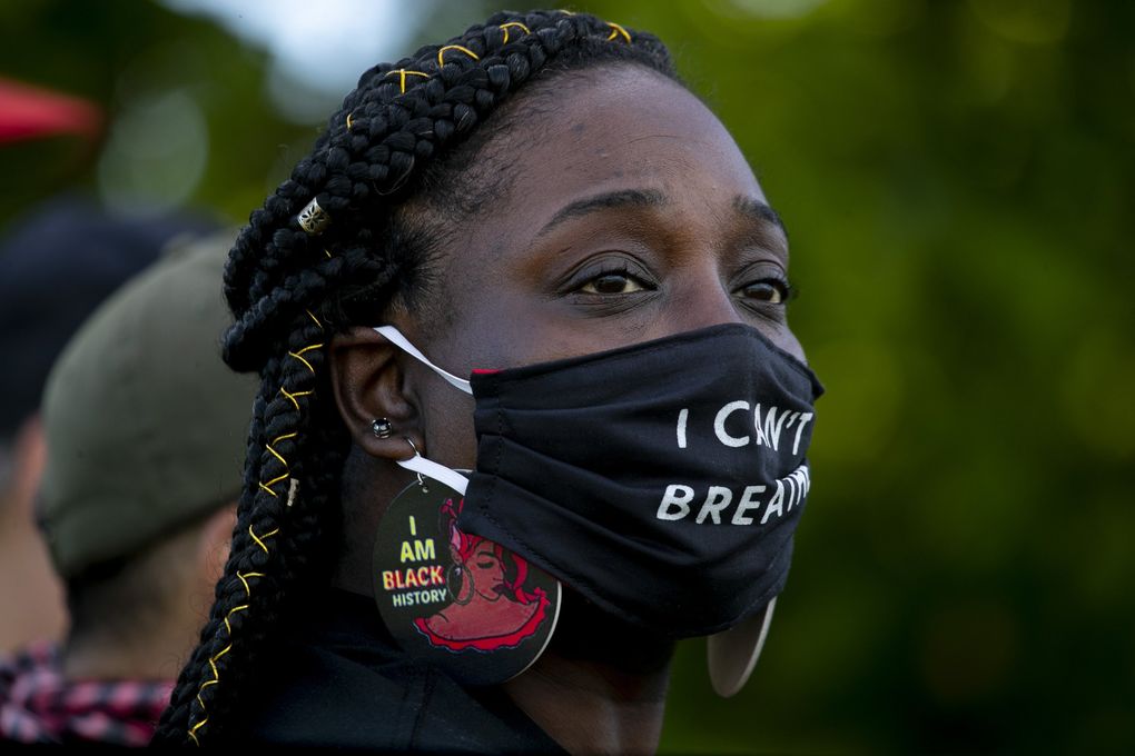 Katrina Johnson, cousin of Charleena Lyles, attends the March for Accountability: Defund SPD & Reinvest in Communities event in June. (Erika Schultz / The Seattle Times)