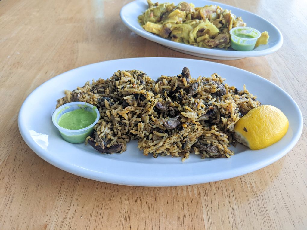 The beef kadaafi with rice and the chicken kati kati at Juba Restaurant & Cafe are flavorful, comforting Somali dishes perfect for blustery winter nights. (Jackie Varriano / The Seattle Times)