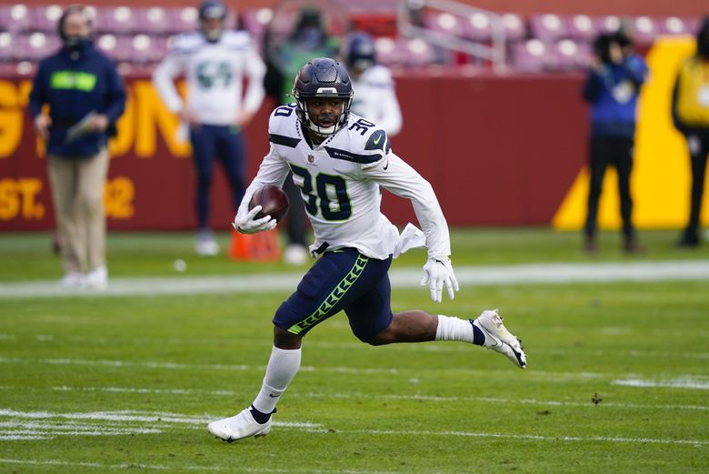 Seahawks activate Rashaad Penny, Damonte Moore to roster, each