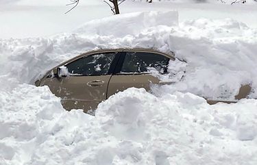 This photo, provided by the New York State Police, shows a car, in Owego, NY, from which a New York State Police sergeant rescued Kevin Kresen, 58, of Candor, NY, stranded for 10 hours, covered by nearly 4 feet of snow thrown by a plow during this week’s storm.  Authorities say the New York State Police sergeant rescued Kresen stranded for hours in a car covered by nearly 4 feet of snow thrown by a plow during this weekâ€™s storm. The 58-year-old Candor man drove off the road and got plowed in by a truck. (New York State Police via AP) NYRD507 NYRD507