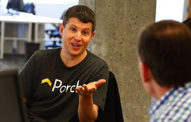 Porch.com CEO Matt Ehrlichman (cq), left, confers with colleagues at the company’s newly remodeled headquarters in Seattle on Wednesday, February 26, 2014. 

PORCH.COM – MATT EHRLICHMAN, CEO – 136677 – 22614