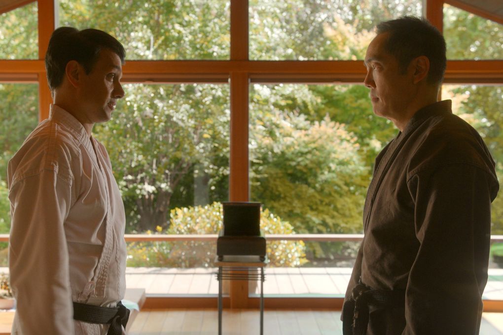 Ralph Macchio, left, and Yuji Okumoto reprise their roles as Daniel and Chozen in Season 3 of Netflix’s “Cobra Kai.” Okumoto played the character of Chozen, the villain, in 1986’s “The Karate Kid Part II.” A few years later, he left Hollywood behind to move to Seattle and marry his wife, Angie. (Courtesy of Netflix)