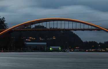 The Rainbow Bridge shines with holiday lights on Friday in La Conner.  WAMVE101
