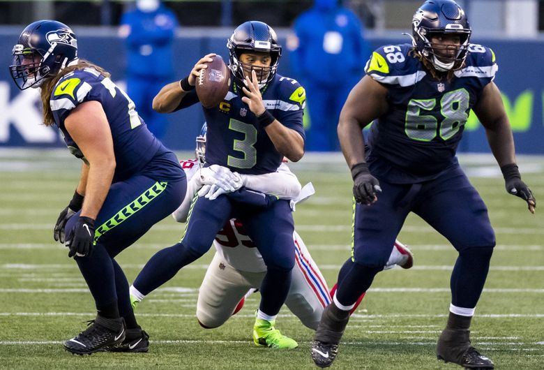 Russell Wilson, Multiple Seahawks Hoping NFL Punts One Helmet Rule - Sports  Illustrated Seattle Seahawks News, Analysis and More