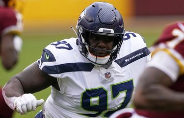 Seattle Seahawks defensive tackle Poona Ford (97) rushes the quarterback during an NFL football game against the Washington Football Team, Sunday, Dec. 20, 2020, in Landover, Md. (AP Photo/Mark Tenally) OTK151 OTK151