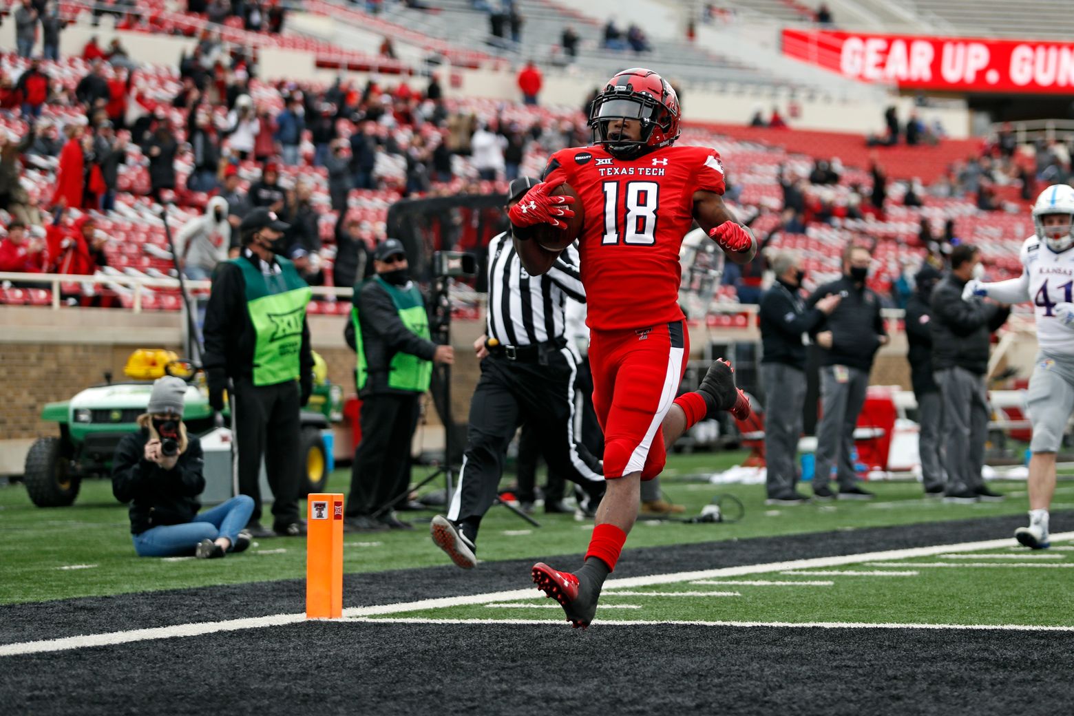 Texas-Kansas among 6 major college games postponed by virus