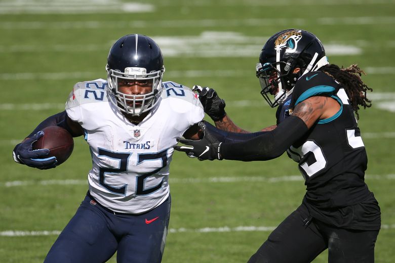 Tennessee Titans running back Derrick Henry (22) carries the ball