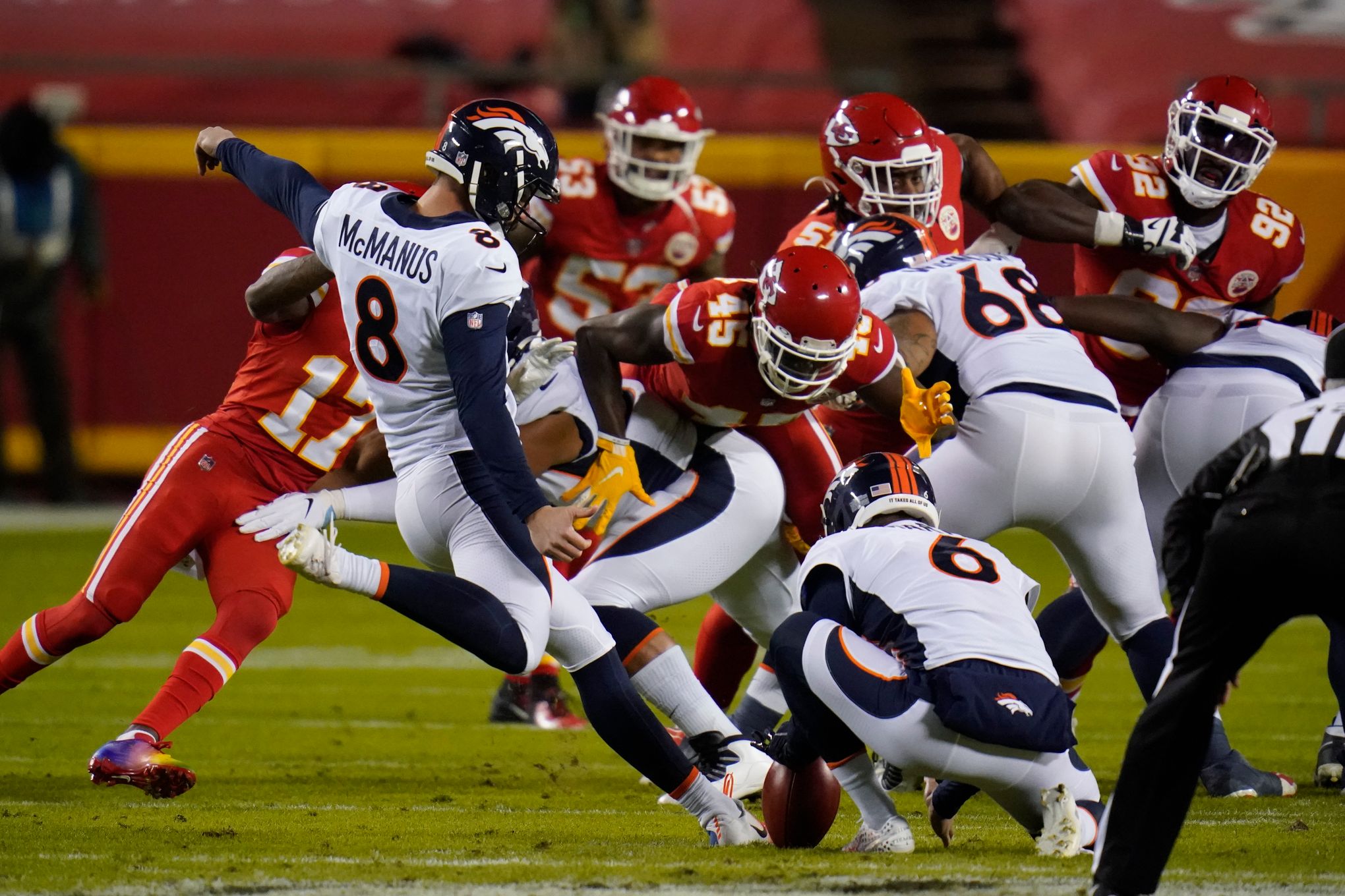 Denver Broncos place kicker Brandon McManus (8) against the New