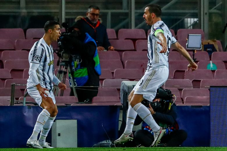 Ronaldo tops Messi with 2 goals in Juve's 3-0 win at Barca