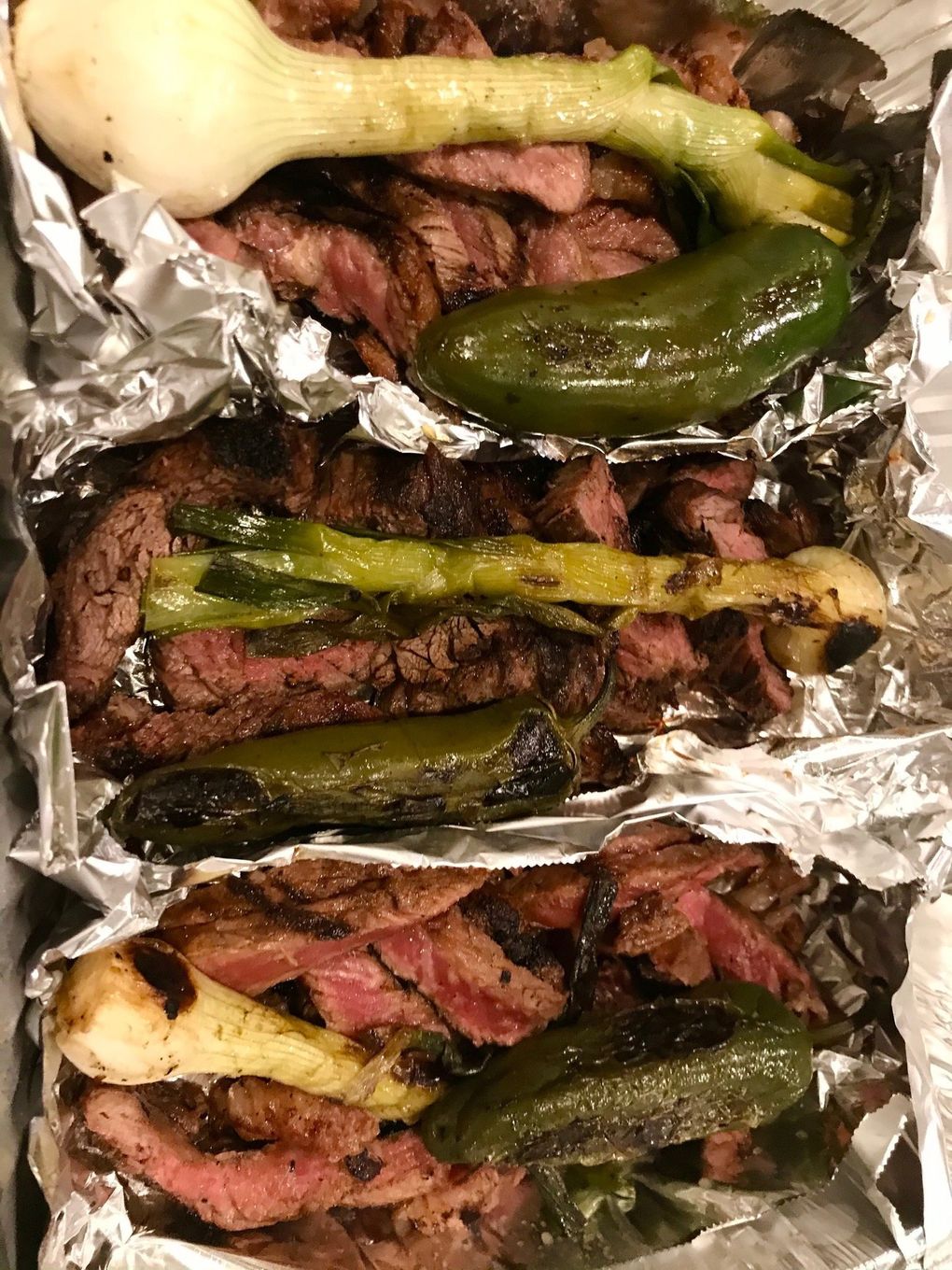 Food critic Tan Vinh calls the beef taco kit at Asadero in Ballard a carnivorous dream: 2 pounds of wagyu ribeye, New York and flap steak with 24 corn tortillas. It also comes with 3 pints of different salsas and all the fixings for $48.99. (Tan Vinh / The Seattle Times)