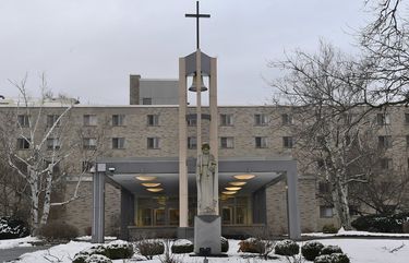 Exterior view of the St. Joseph’s Provincial House, Tuesday, Jan. 5, 2021, in Latham, N.Y.  The home for retired and infirm nuns lost nine residents to COVID-19 during December as the coronavirus pandemic’s second wave surged in upstate New York. (AP Photo/Hans Pennink) NYHP103 NYHP103
