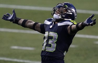 Seattle Seahawks strong safety Jamal Adams (33) reacts to a play against the Los Angeles Rams during the second half of an NFL football game, Sunday, Dec. 27, 2020, in Seattle. The Seahawks won 20-9. (AP Photo/Elaine Thompson) SE164 SE164