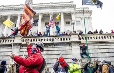 Protesters at the Senate side of the U.S. Capitol in Washington on Wednesday, Jan. 6, 2021. As America’s European allies digested events that rocked Washington, many expressed faith in the strength of U.S. democracy to prevail. (Jason Andrew/The New York Times) XNYT4 XNYT4