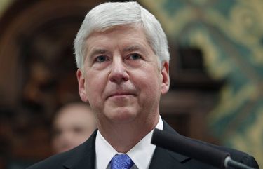 FILE – In this Jan. 23, 2018, file photo, former Michigan Gov. Rick Snyder delivers his State of the State address at the state Capitol in Lansing, Mich. Former Gov. Snyder, Nick Lyon, former director of the Michigan Department of Health and Human Services, and other ex-officials have been told they’re being charged after a new investigation of the Flint water scandal, which devastated the majority Black city with lead-contaminated water and was blamed for a deadly outbreak of Legionnaires’ disease in 2014-15, The Associated Press has learned. (AP Photo/Al Goldis, File) CER203 CER203