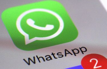 FILE – This Friday, March 10, 2017, file photo shows the WhatsApp communications app on a smartphone, in New York. In early January 2021,  (AP Photo/Patrick Sison, File) NYSB331