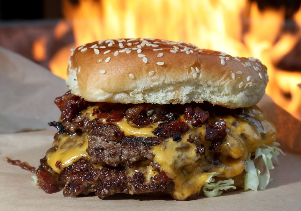 At Burbs Burgers on South King Street, the Burbs Special comes with double meat, American cheese, grilled onions, pickles, special sauce and shredded lettuce. (Greg Gilbert / The Seattle Times)