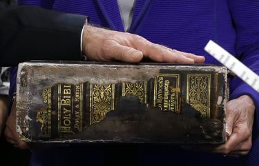 FILE – In this Sunday, Jan. 20, 2013 file photo, Vice President Joe Biden, left, places his hand on the Biden family Bible held by his wife, Jill Biden, center, as he takes the oath of office from Supreme Court Justice Sonia Sotomayor, right, during an official ceremony at the Naval Observatory in Washington. While many presidents have used Bibles for their inaugurations, the Constitution does not require the use of a specific text and specifies only the wording of presidentâ€™s oath. That wording also doesnâ€™t include the phrase â€œso help me God,â€ but every modern president has appended it to their oaths and most have chosen symbolically resonant Bibles for their inaugurations. (AP Photo/Carolyn Kaster) NY582 NY582