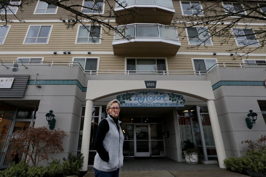 Ginnie Hance manages an apartment building in West Seattle, the Ivy Court. Hance plans to drop rents slightly for two apartments she will list next month. (Alan Berner / The Seattle Times)